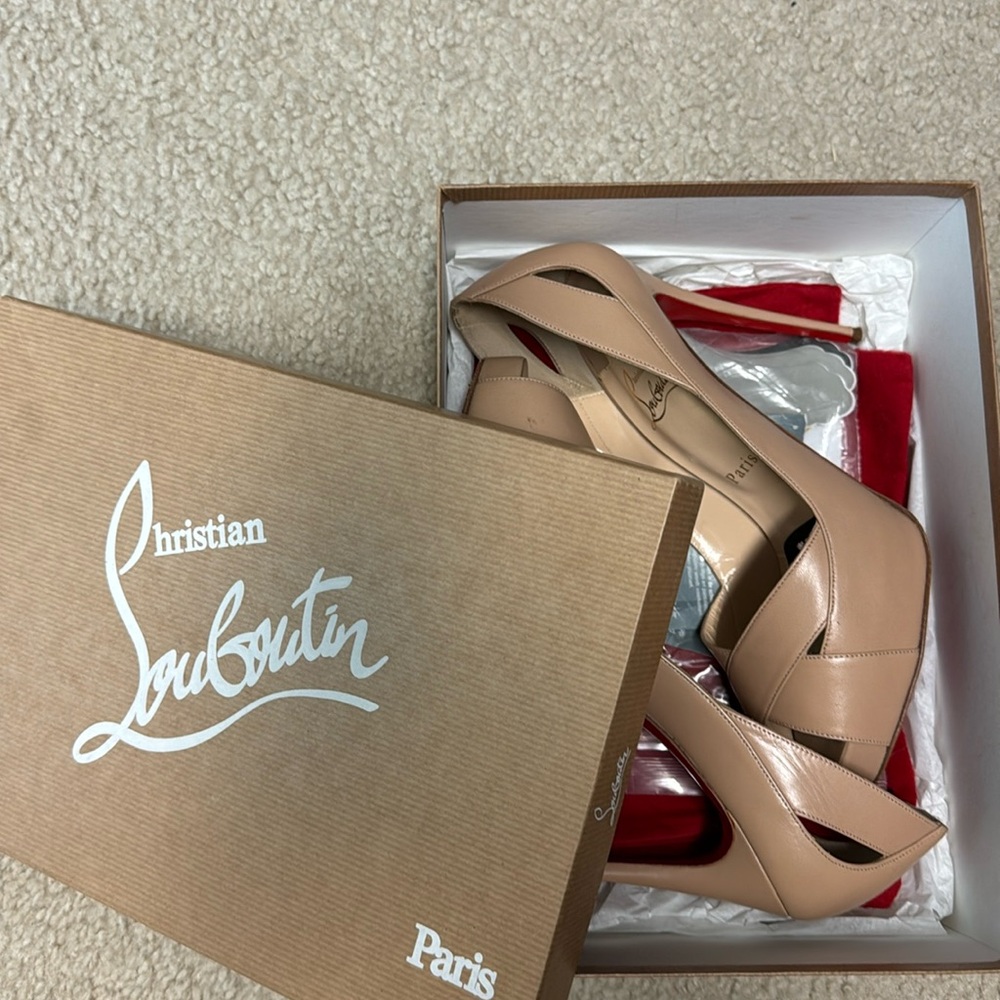 Christian Louboutin nude academa platform heels from Neiman Marcus.